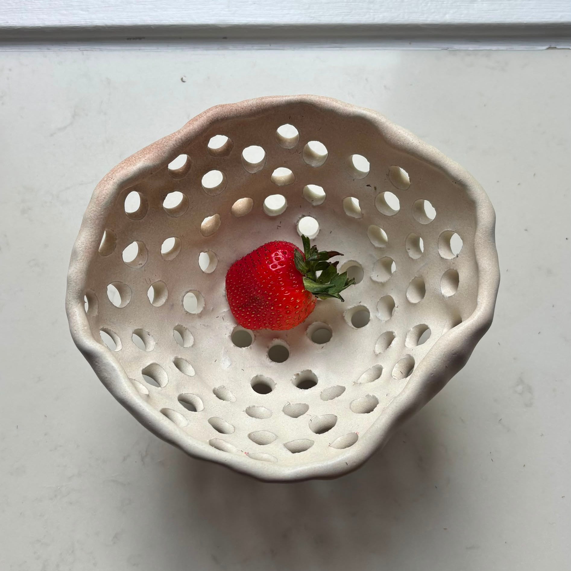 A. Mills Clay Colanders