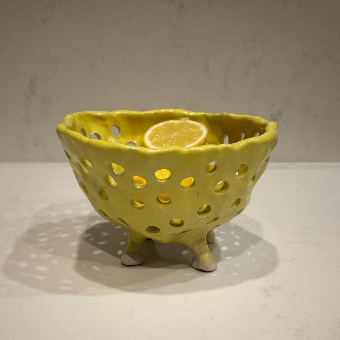 A. Mills Clay Colanders