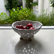 A. Mills Clay Colanders
